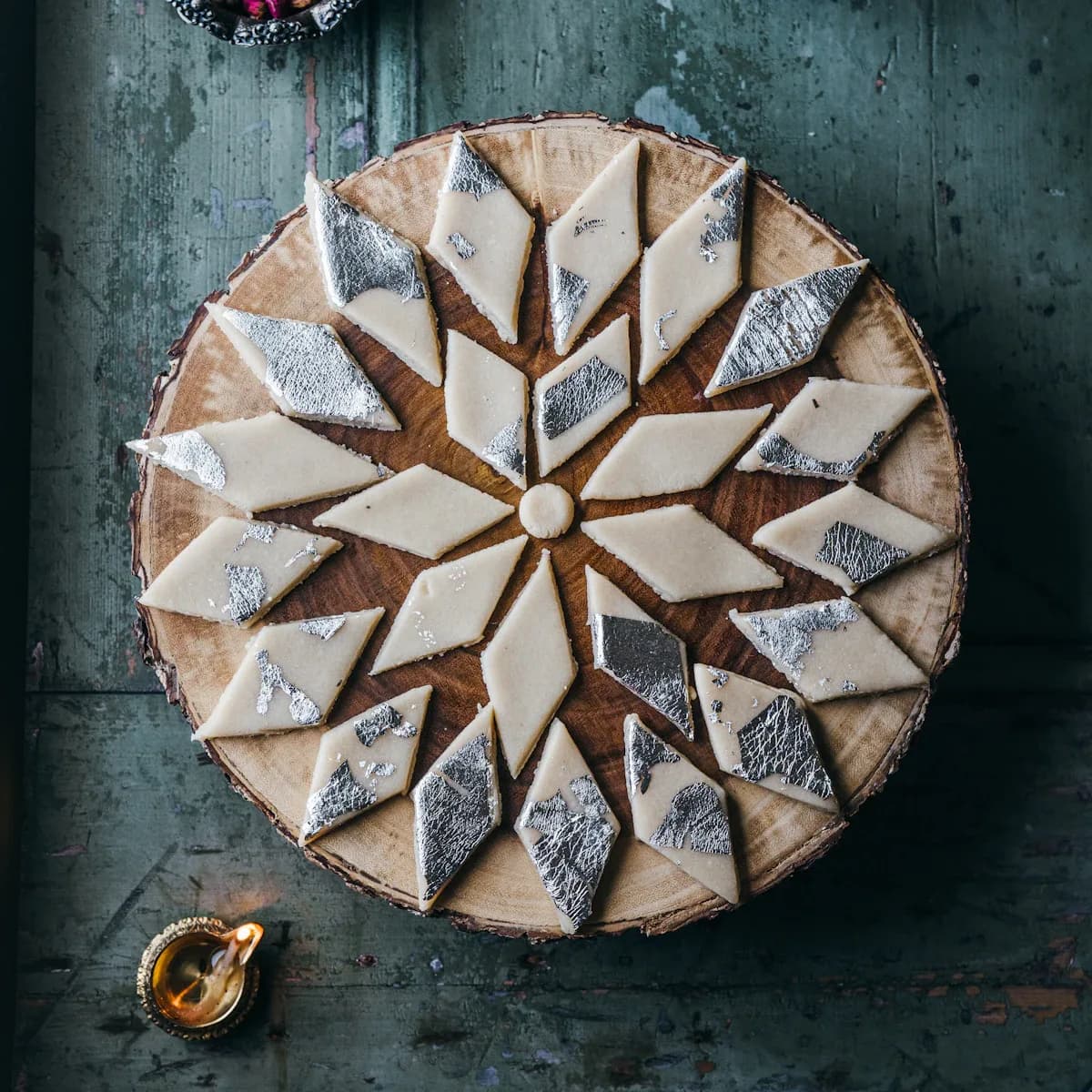Kaju katli diamonds arranged in a star on a plate