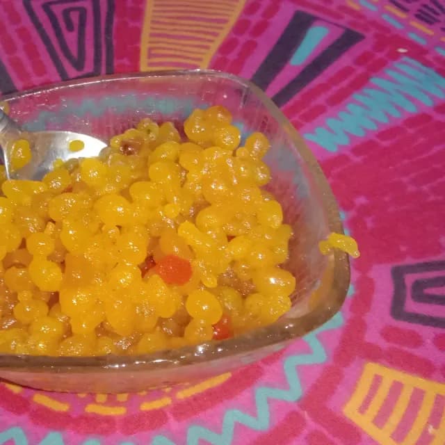 A bowl of sweet golden boondi for prasad
