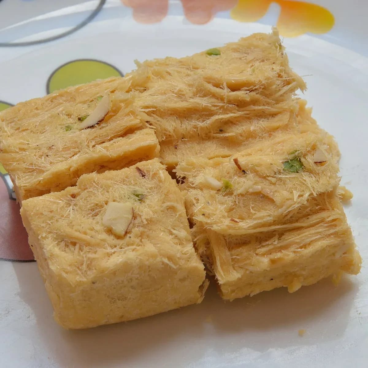 Flaky soan papdi cubes with almond and pistachio