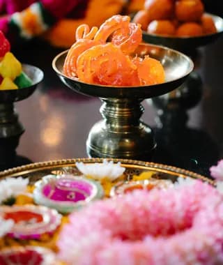 Jalebi on a brass stand
